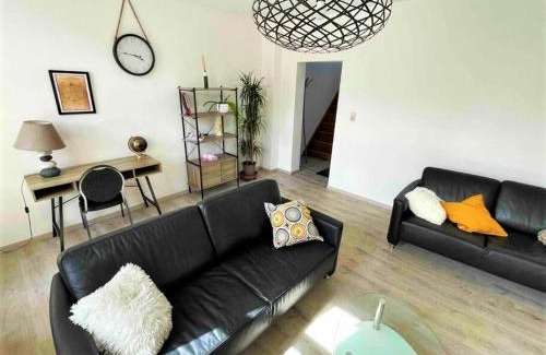 Ans Apartment | Cozy Duplex Steps from Amenities with Eco-Friendly Comfort