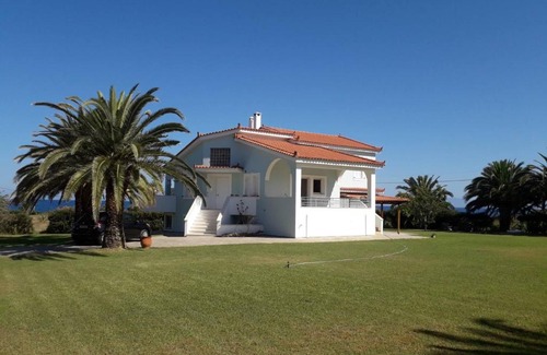 Agrilos Villa | Oceanfront Agrilis Home: Guest Rated 9.8/10 Experience