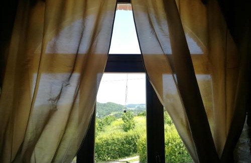 Bubbio Apartment | Discover Agriturismo Mondo: Oceanfront Retreat with Hot Tub
