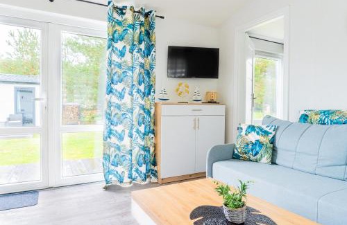 Ostrowo House | Relax at "AGUŚ": Modern Cabins Near the Beach, Pet Friendly