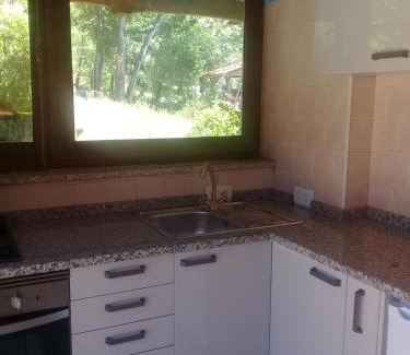 Moitas Apartment | Agua Azul: Eco-Friendly Poolside Retreat in Woodland Bliss