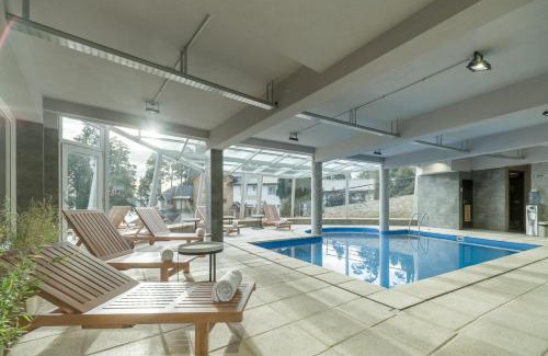 San Carlos de Bariloche Hotel | Relax at Aguila Mora Suites & Spa with Pet-Friendly Amenities