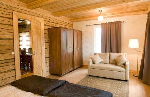 Kauhajoki Ski Chalet | Ahmalammen Mökkikylä: Ocean View with Private Beach Access