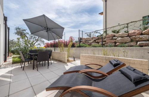 Marciaga Apartment | Relaxing Family Retreat at Ai Colli Garden Apartment