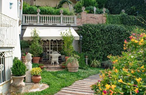 Ottiglio Apartment | Discover Ai Leoni Ruggenti: Secret Garden with Monferrato Views