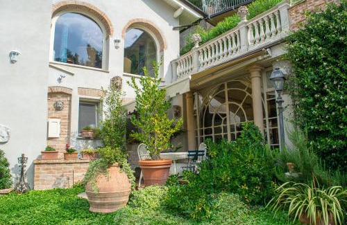 Ottiglio Apartment | Discover Ai Leoni Ruggenti: Secret Garden with Monferrato Views