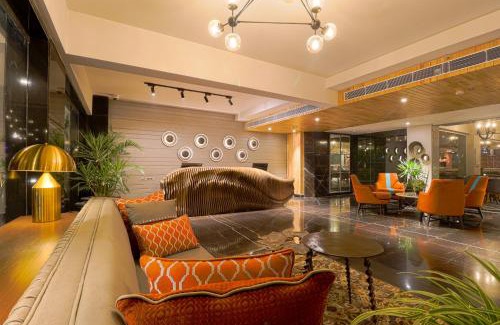 DLF City Hotel | Relax at AIR by Ahuja Residences - 4-Star Family Retreat