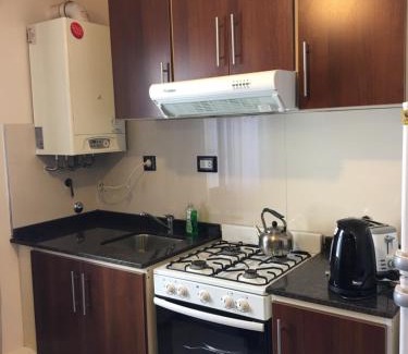 Villa Carlos Paz Apartment | Oceanfront Getaway at Aires de la Villa - Guest Rated 10/10