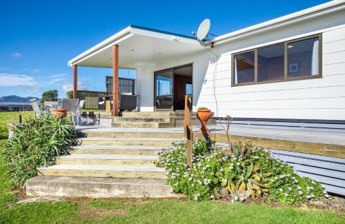 Te Kaha House | Seaside Escape at Airi Kainga with Private Beach & Ocean Views