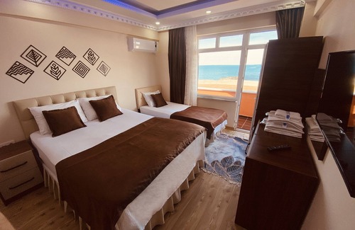 Karaburun Koyu Hotel | Convenient Stay at Airport Kumsal Otel with Family Amenities