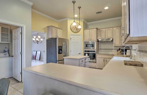 Travis Landing Villa | Airy Villa in Austin w/Badminton/Volleyball Court