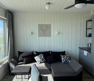 Klaipeda District Municipality Apartment | Pet-Friendly Aitvarai 41: Rated 9/10 for Families