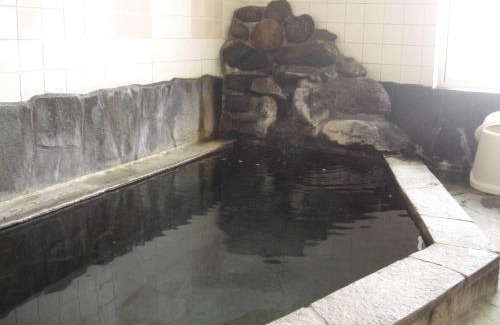 Myoko Hotel | Discover Akakura Yours Inn: Family-Friendly & Hot Tub Bliss