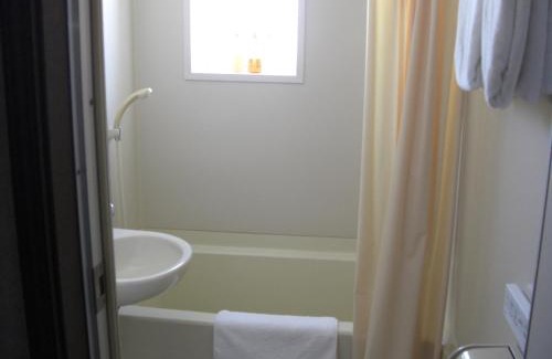 Myoko Hotel | Discover Akakura Yours Inn: Family-Friendly & Hot Tub Bliss