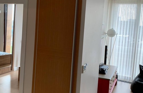 Esenyurt Apartment | Explore Akbati Green Tower: Relax by the Pool & Enjoy Breakfast