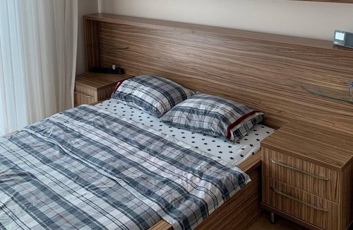 Esenyurt Apartment | Explore Akbati Green Tower: Relax by the Pool & Enjoy Breakfast