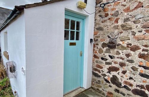 Akeld House | Welcoming Akeld Cottage: Pet & Child-Friendly Retreat
