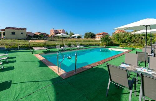 Agios Georgios Pagon Apartment | Inviting Akis Villa Studios & Apartment with Pool and Ocean View