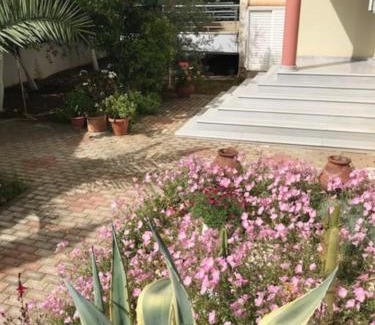 Paralia Porovitsis Apartment | Family-Friendly Akrata Rose Garden Apartments for Your Stay