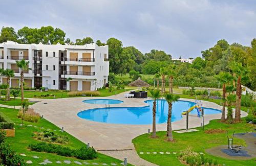 Cabo Negro Apartment | Inviting AKS Home Appart 1 with Oceanfront Pool Access