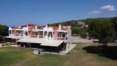 Sithonia House | Seafront Bliss at Aktea Houses - Rated 9.8/10