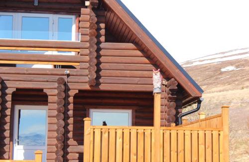Akureyri House | Experience Family Comfort at Akureyri Log Cottage