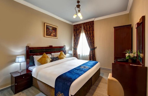 Al Qasimia Apartment | Al Bustan Tower Suites: Family-Friendly 4-Star Retreat