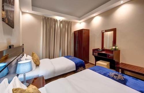 Al Qasimia Apartment | Al Bustan Tower Suites: Family-Friendly 4-Star Retreat
