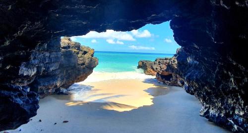 Ngazidja Cabin | Experience Al Camar Lodge: Oceanfront Escape with Pool