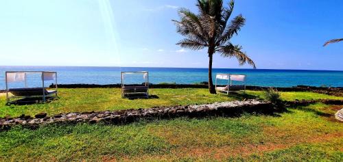 Ngazidja Cabin | Experience Al Camar Lodge: Oceanfront Escape with Pool