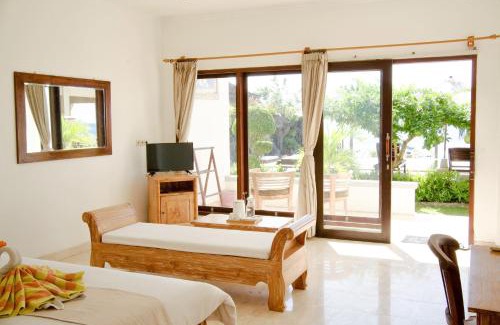 Purwakerti Hotel | Relax at Alam Bali Beach Resort with Oceanfront Views