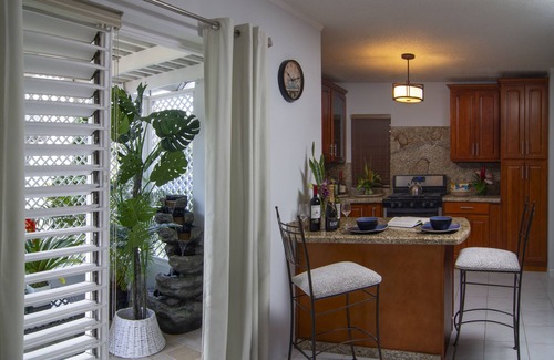 IronShore Estates Cottage | Experience Alamanda Cottage: Oceanfront Retreat with Pool