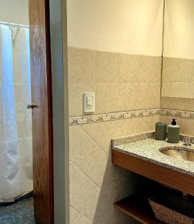 Villa Carlos Paz Hotel | Discover Alamo Hotel: Oceanfront Escape with Pool Access