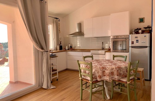 Capoliveri House | Alba a Straccoligno: Perfect Family Retreat with Garden