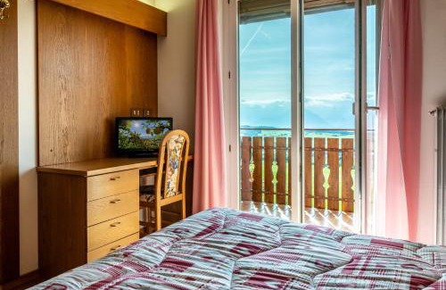 Malosco Hotel | Relax at Albergo Bucaneve with Oceanfront Views & Spa