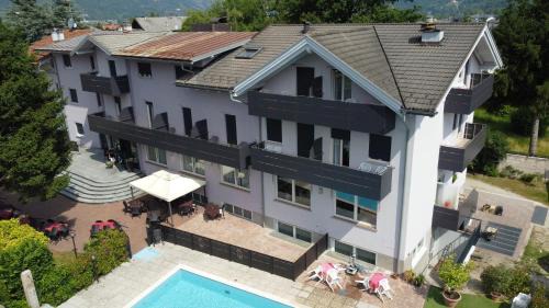 Caldonazzo Hotel | Welcoming Albergo Gilda: Pool, Dining & Great Reviews