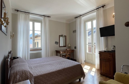 Castiglione d'Intelvi Hotel | Experience Comfort at Albergo La Torre with Pool & Dining