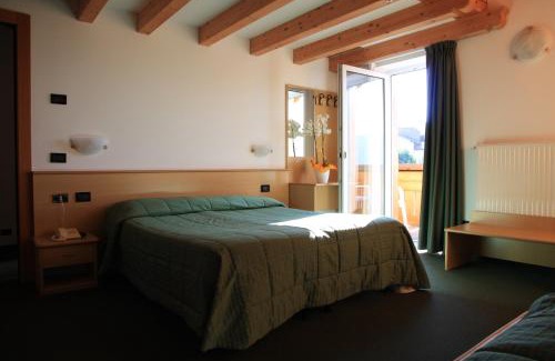 Gionghi-Cappella Hotel | Discover Albergo Miramonti: Pet-Friendly & Family-Focused