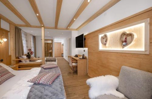 Fai della Paganella Hotel | Pet-Friendly Albergo Miravalle with Spa & Hot Tub Access