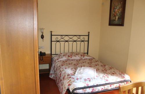 Porrena Hotel | Comfortable Stay at La Torricella with Family-Friendly Amenities