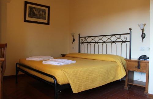 Porrena Hotel | Comfortable Stay at La Torricella with Family-Friendly Amenities