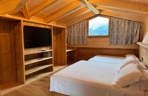 Caviola Hotel | Pet-Friendly Albergo Scoiattolo with Oceanfront Views