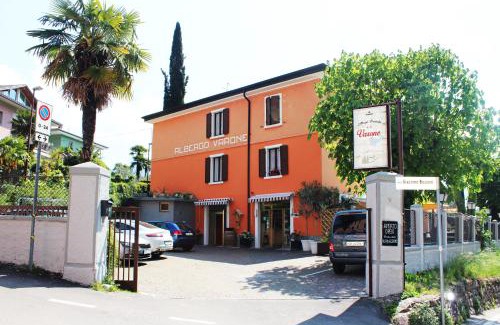 Riva del Garda Hotel | Inviting Stay at Albergo Varone: Pet-Friendly & Dining Options