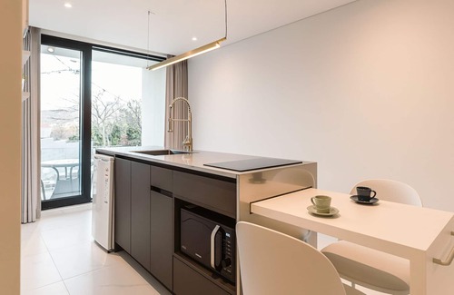 Gyeongju House | Elegant Albescent Pool Villa with Family-Friendly Amenities