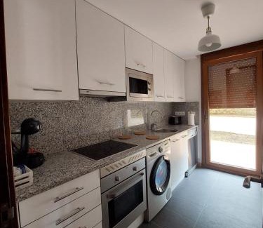 Bricia Apartment | Family-Friendly Escape at Aldea Bricia 20 Bajo Jardin