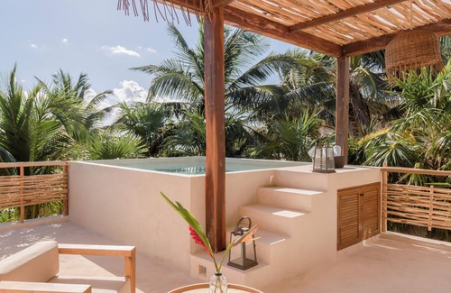 Zona Hotelera House | Discover Aldea Canzul Tulum: Oceanfront Retreat Awaits