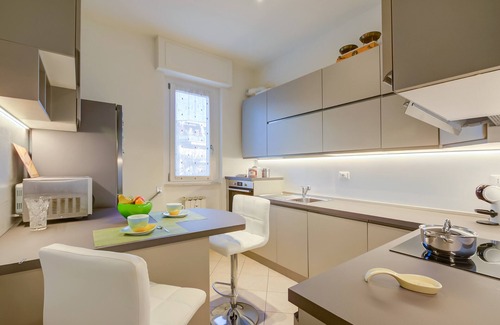 Carciano Apartment | Elegant Alelù: Chic Lakeside Retreat in Stresa, Italy