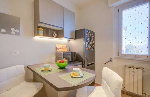 Carciano Apartment | Elegant Alelù: Chic Lakeside Retreat in Stresa, Italy