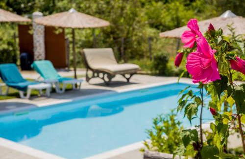 Tragilos Villa | Guest Rated: Alexander Aqua Oasis - Poolside Garden Retreat