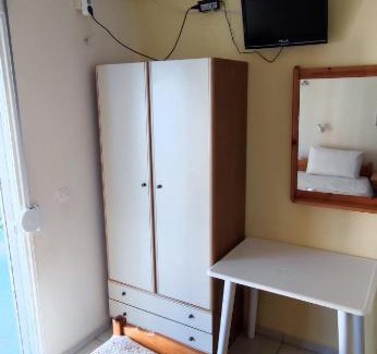 Olymbiaki Akti Apartment | Family-Friendly Retreat at Alexander Hotel for Memorable Stays